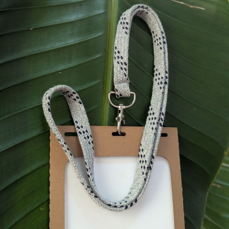 Repurposed grew drawstring sustainable lanyard with plastic free badge holder