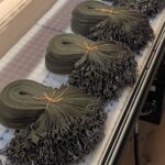 Bundle of US-made, eco-friendly lanyards made from recycled 1972 military webbing