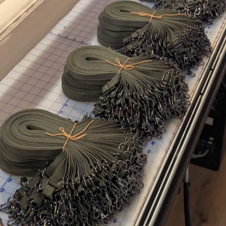 Bundle of US-made, eco-friendly lanyards made from recycled 1972 military webbing