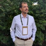 Man wearing eco-friendly recycled material adjustable double hook lanyard made in USA