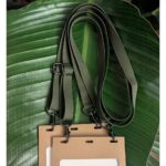 Two plastic-free name badge holders and adjustable, double-hook salvaged materials lanyards for purchase or rent