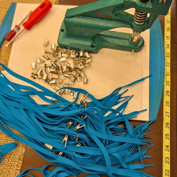 Producing lanyards from deadstock textile waste for recycled, eco-friendly conference and event lanyards