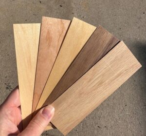Wood species for eco-friendly event and festival wood paper overlay wristbands.