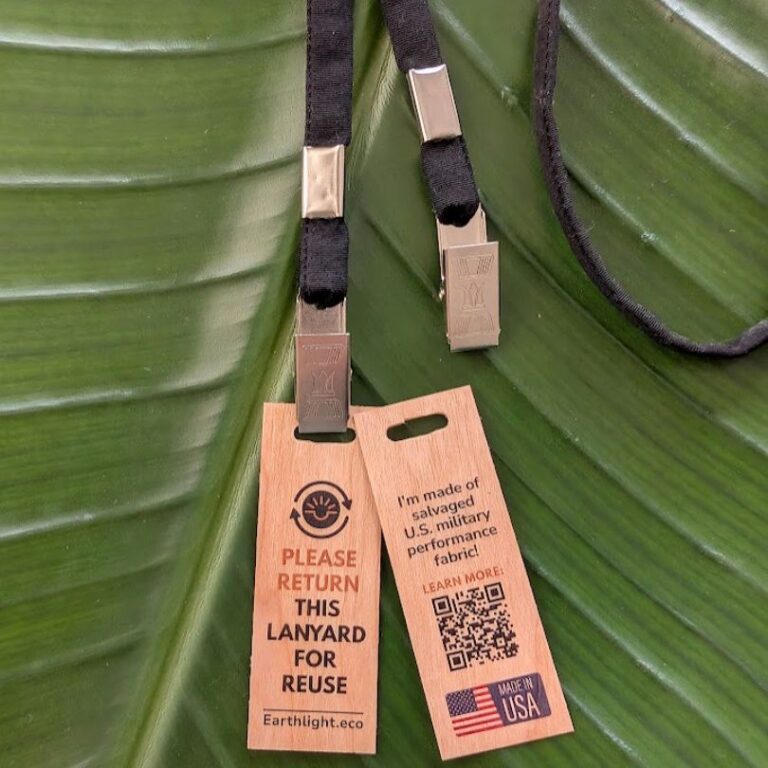 Close up of wood return hang tag for black lanyard with double bulldog clips made from salvaged materials in USA