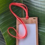 Eco-friendly wood and paper 4.25 x 6 event badge holder with salvaged drawcord sustainable lanyard
