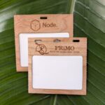 Reusable, custom laser branded 4" x 3" cherry wood badge and name tag holders for sustainable events, conferences and meetings